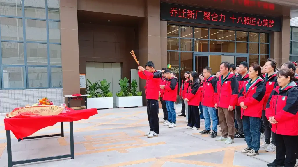 Padmat Rubber employees at new factory blessing ceremony with incense and offerings