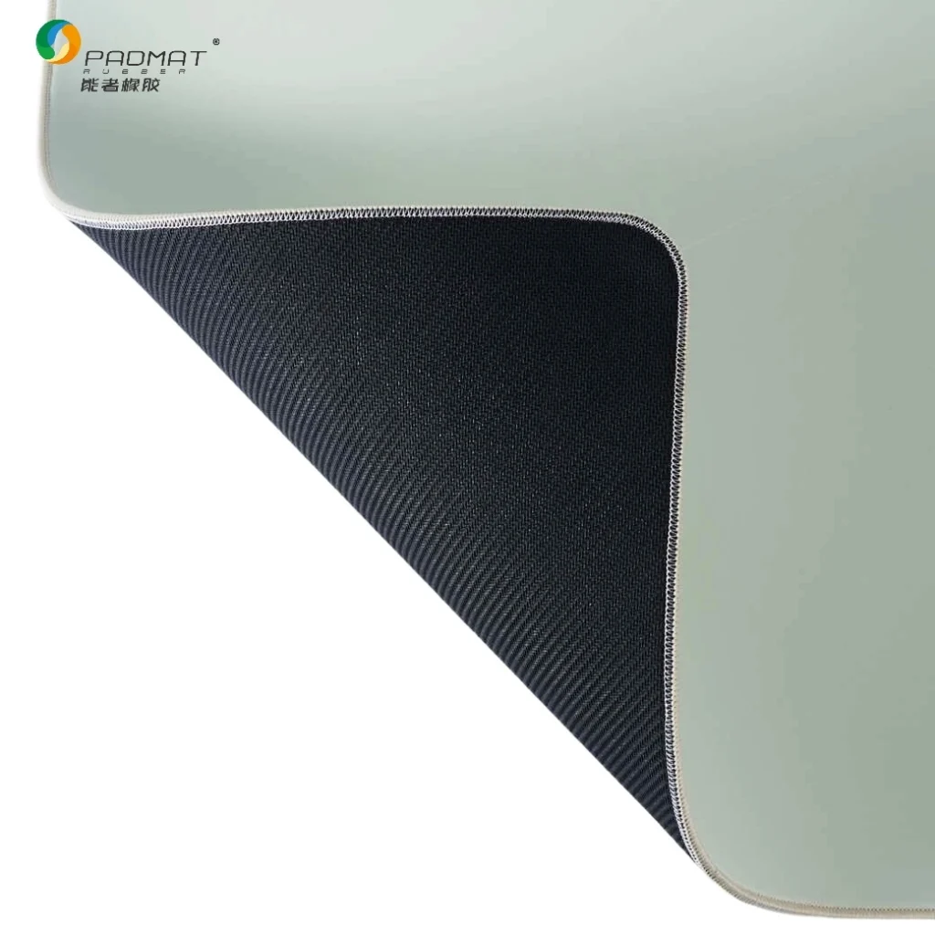 Front‑back display of polyurethane foam gaming mouse pad with foam‑coated top surface and eco‑friendly natural rubber base