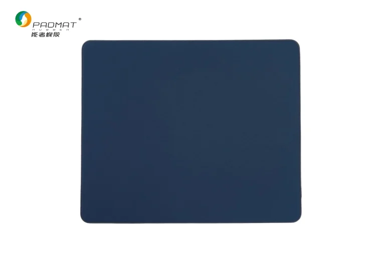 Cloth gaming mouse pad with woven surface and natural foam rubber base, produced by a professional gaming mouse pad manufacturer.