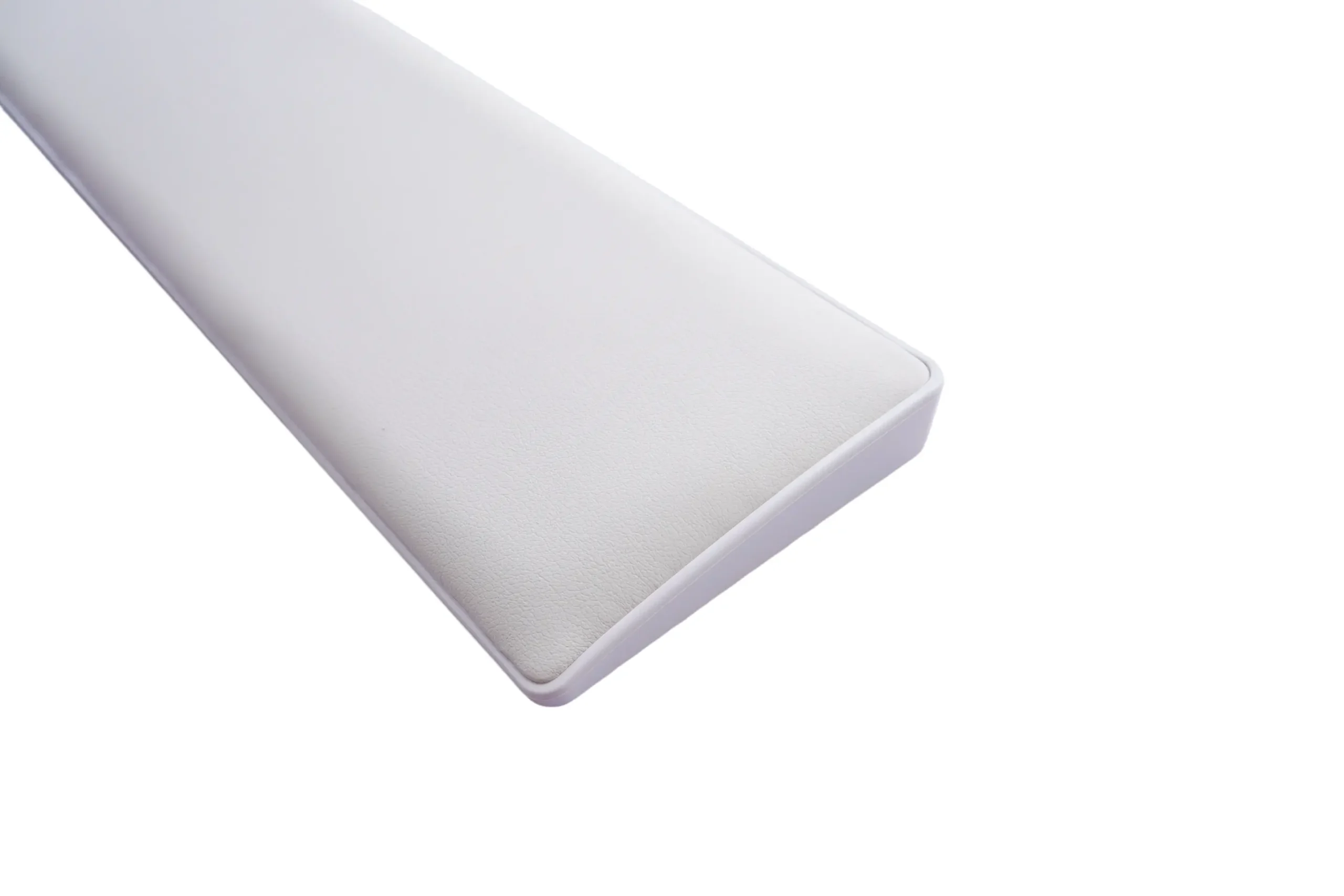 Cross-section diagram of memory foam wrist rest showing PU leather surface, slow-rebound foam core, and plastic shell base