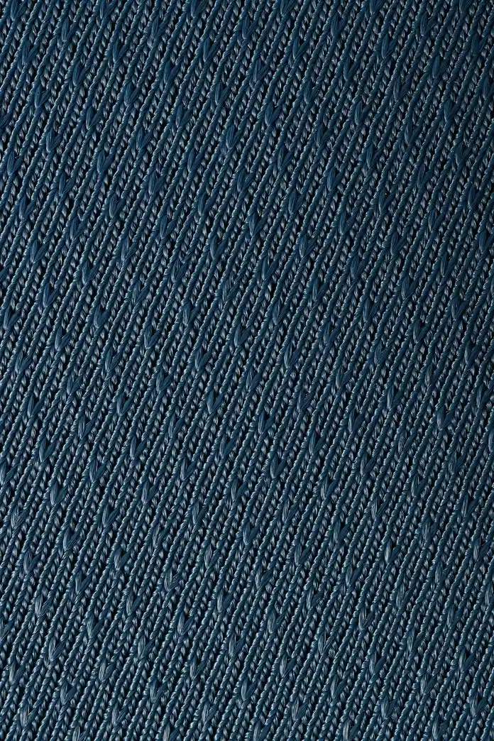 Blue diamond knit fabric texture close-up from Padmat Rubber custom mouse pad surface material