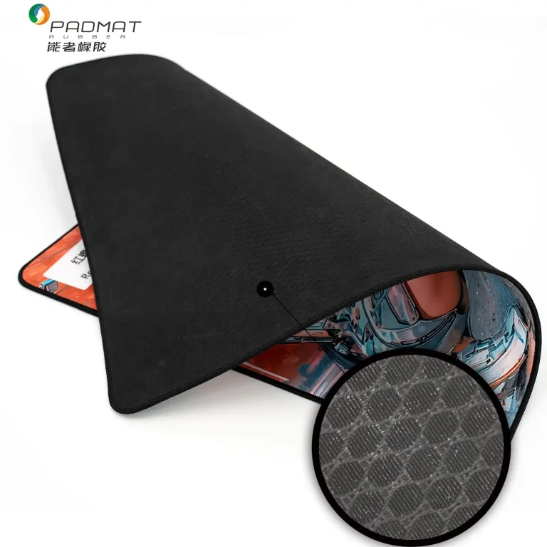 Red Toad mouse pad rolled to show backside hexagonal rubber texture with circular magnified inset