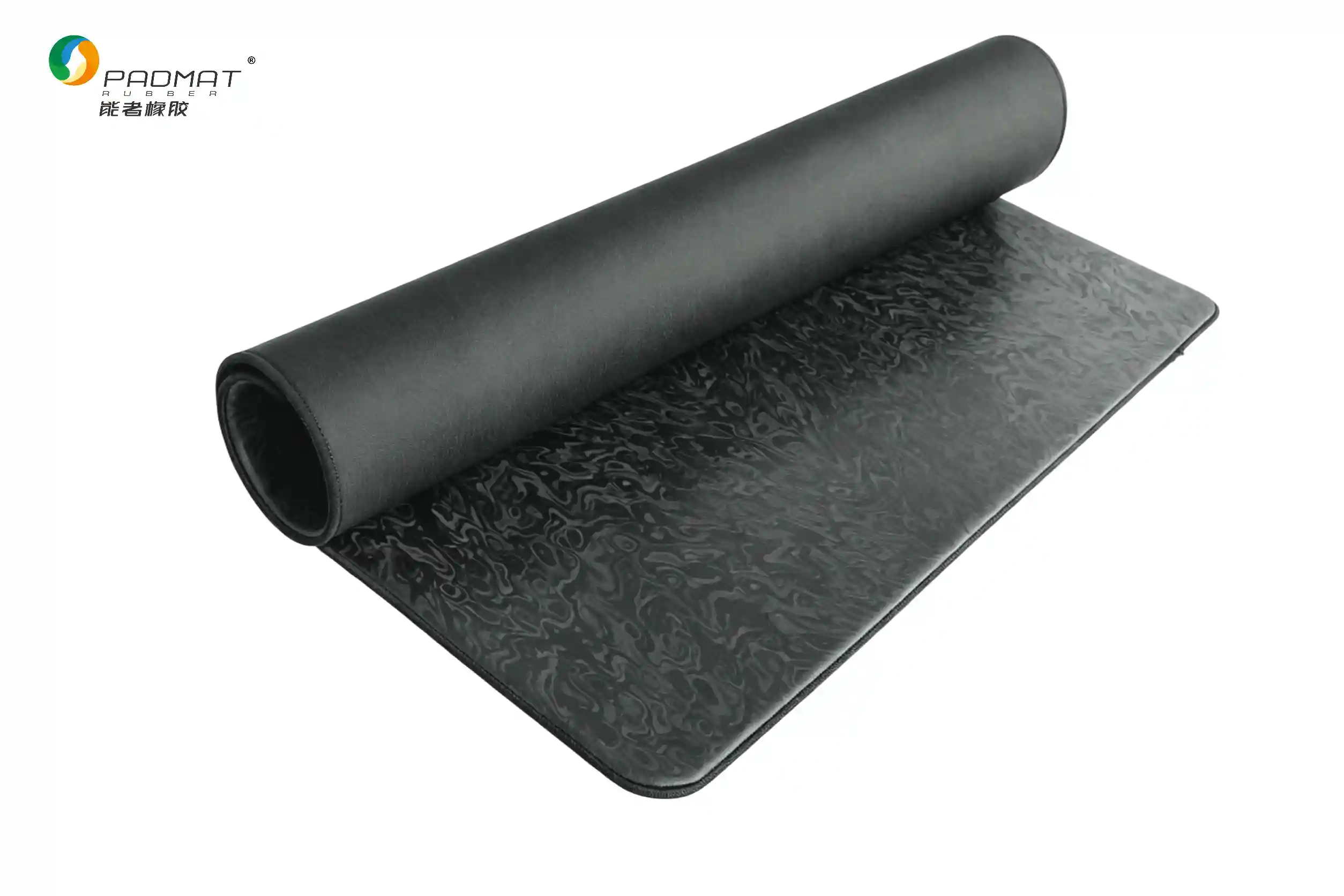 Artifact Spirit gaming mouse pad rolled up showing smooth black surface, black edge stitching, and flexible construction.