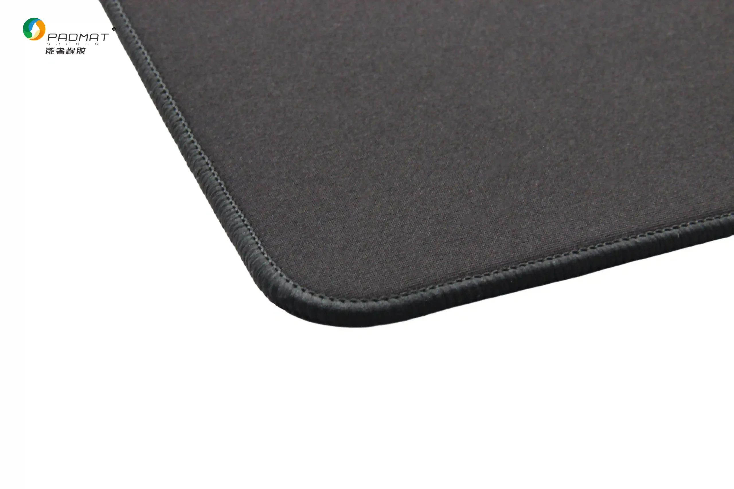 Close-up of Black Horse gaming mouse pad showing black edge stitching with narrow precision locking for durable construction.