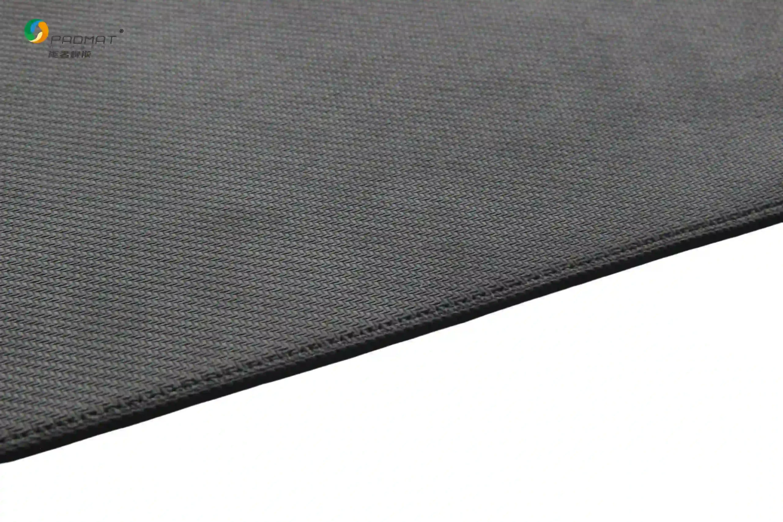 Close-up of Black Horse gaming mouse pad showing high-density fiber surface texture and precision narrow edge stitching.