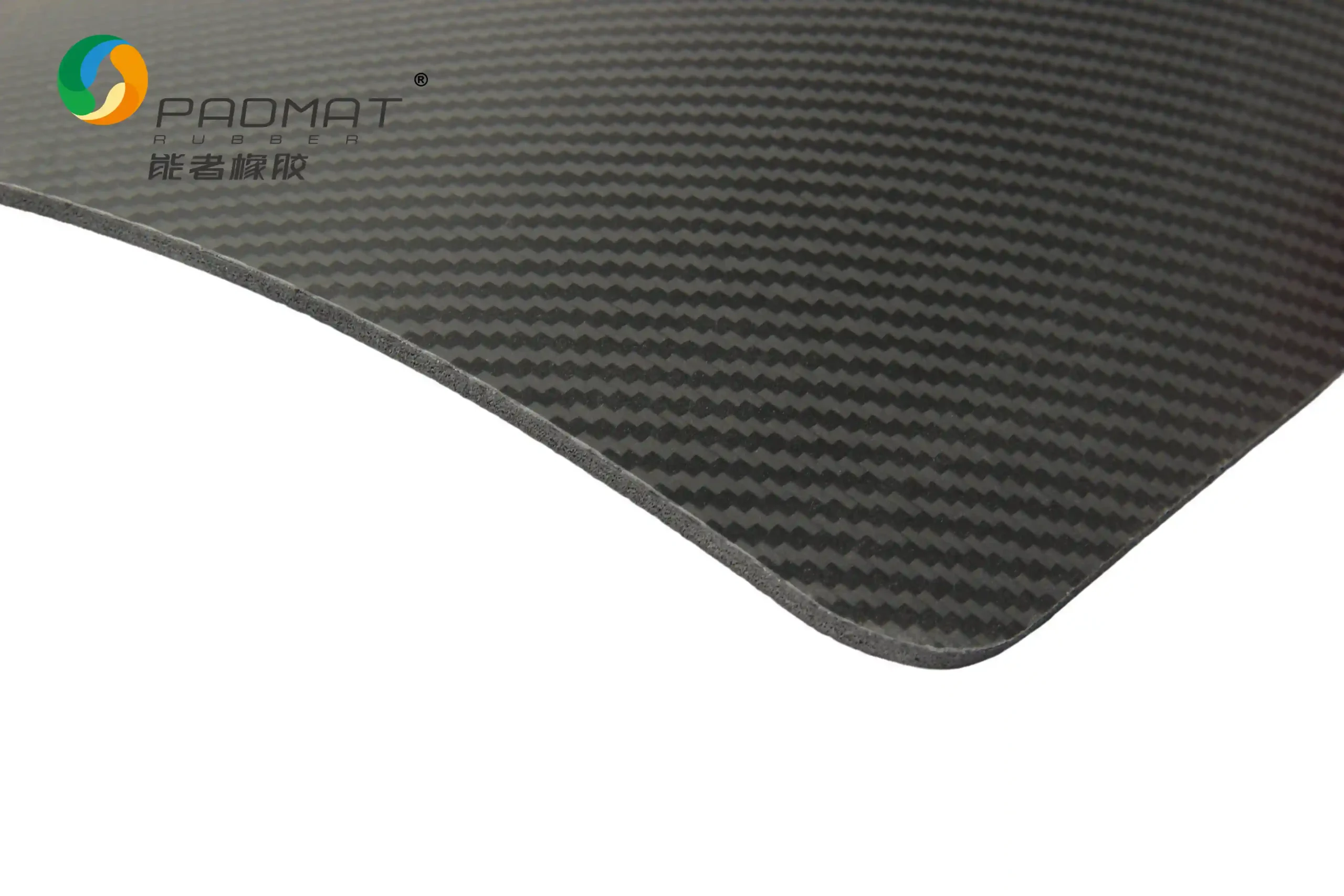 Close-up of Carbon Fiber gaming mouse pad edge showing high-end carbon fiber twill weave texture with frosted coating and fine sand feel.