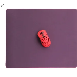 Danming speed gaming mouse pad with solid purple surface and red lightweight gaming mouse on top, designed for low friction and fast tracking.