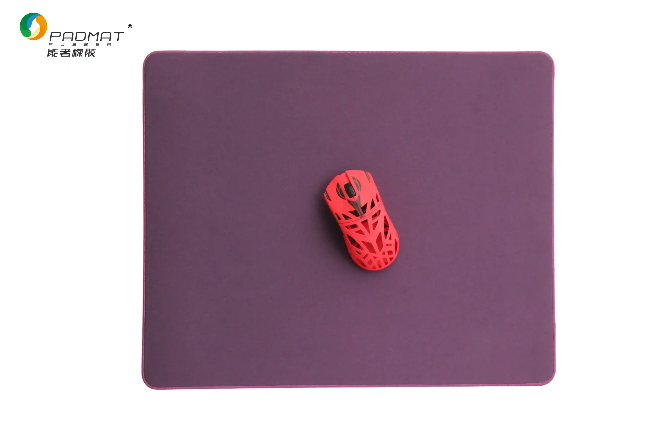 Danming speed gaming mouse pad with solid purple surface and red lightweight gaming mouse on top, designed for low friction and fast tracking.