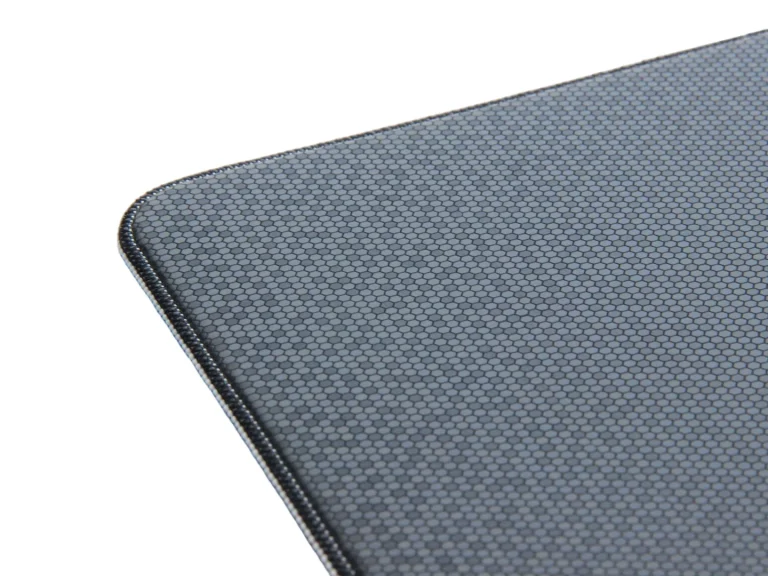 Corner macro detail of Luolan mouse pad, dense micro textured PORON base for strong desktop anti-slip grip