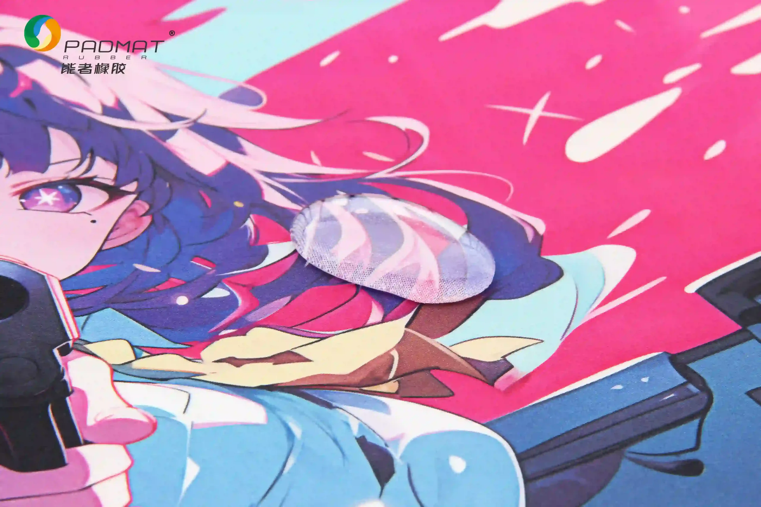Water droplet sitting on Waterproof Pearl gaming mouse pad surface with pink anime artwork, demonstrating 4-level water resistance and beading effect.