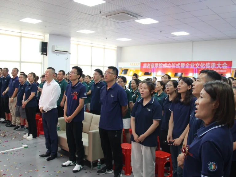 Padmat Rubber team standing together in unity, reciting the company's core corporate culture values at the launch ceremony.