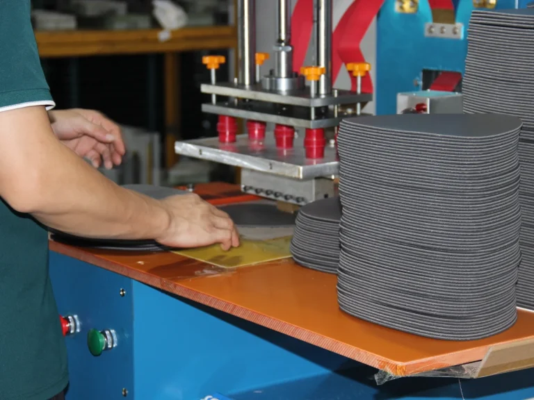 High frequency welding equipment in Patmat production workshop, completing thermal composite pressing of rubber mouse pads